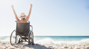 Six of the best European travel destinations woman in wheelchair on beach
